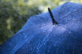 Can the UV Umbrella be used for both sunny and rainy days?