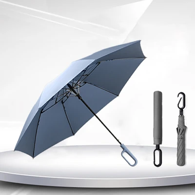 Two folding umbrellas with o-shaped handle